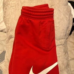 Red Nike shorts